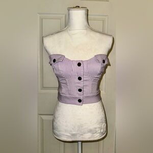 Lavendar button up bustier. Similar looking to the Chanel spring 1994 collection